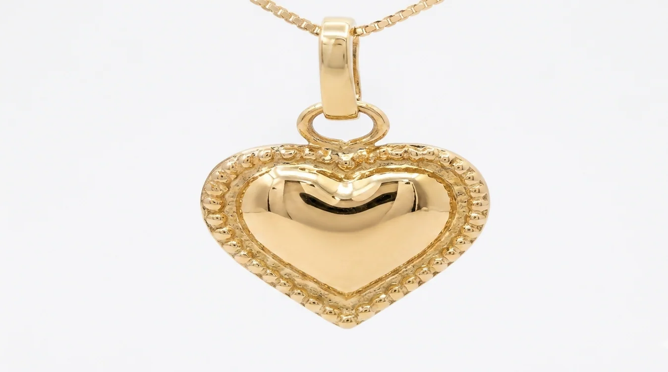 DIJE CORAZON TROQUELADO CON LAZO